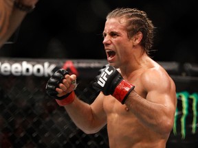 LAS VEGAS, NV - DECEMBER 12:  Urijah Faber celebrates his victory over Frankie Saenz in their bantamweight fight during UFC 194 on December 12, 2015 in Las Vegas, Nevada.