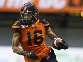 B.C. Lions receiver Bryan Burnham eludes a tackle against Calgary at B.C. Place Stadium on Aug. 19. Burnham is seventh in the CFL with 848 yards on 47 catches through 11 games.