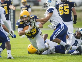South Delta's Stef Goulas had to earn every yard Saturday at home to Victoria's Belmont Bulldogs. (Arlen Redekop, PNG photo)