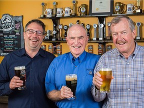 From left, Tim Barnes, new president of Vancouver Island Brewery, Barry Fisher, former owner, and new VIB owner Bob MacDonald.