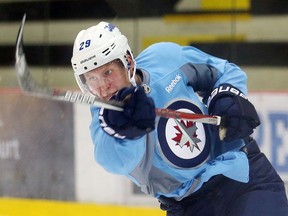 Winnipeg Jets forward Patrik Laine fires a shot on net during practice in Winnipeg on Monday.