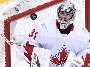 Team Canada goalie Carey Price (31) makes a save against Team Europe during second period World Cup of Hockey finals action in Toronto on Thursday, September 29, 2016. The club began the 2015-16 campaign with a team record nine-game winning streak and was 19-4-3 on Dec. 1, but with star goalie Carey Price gone for the rest of the season with a knee injury suffered on Nov. 25, they lost nine of their next 10 games and spiralled down to 13th in the NHL Eastern Conference. THE CANADIAN PRESS/Nathan