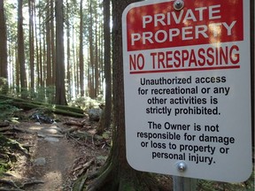The Canada Mortgage and Housing Corporation had put up at least 25 no trespassing signs on the property they own on Mount Seymour.