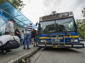 A Blue Bus picks up passengers outside Park Royal shopping centre in West Vancouver in September 2016. Transit fares will be increasing July 1.