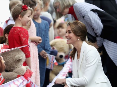 VICTORIA, BC - OCTOBER 01:  Catherine, Duchess of Cambridge meets children at Cridge Centre for the Family on the final day of their Royal Tour of Canada on October 1, 2016 in Victoria, Canada. The Royal couple along with their Children Prince George of Cambridge and Princess Charlotte are visiting Canada as part of an eight day visit to the country taking in areas such as Bella Bella, Whitehorse and Kelowna