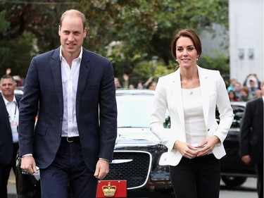 Kate and William greet the crowd following the unveiling of a momunent at the Cridge Centre in Victoria on Saturday.