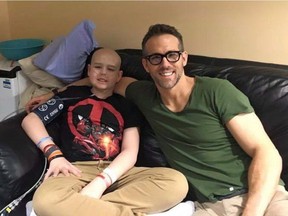 Actor Ryan Reynolds poses for a photo with 13-year-old Connor McGrath that the actor posted on Facebook. Reynolds penned an emotional online tribute to a Newfoundland-born cancer victim Sunday, honouring what would have been McGrath's 14th birthday.