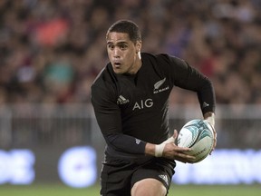 All Blacks halfback Aaron Smith runs with the ball against South Africa during the Rugby Championship test match between New Zealand and South Africa, in Christchurch, New Zealand, Saturday Sept. 17, 2016(Brett Phibbs/New Zealand Herald via AP) ORG XMIT: NZH805