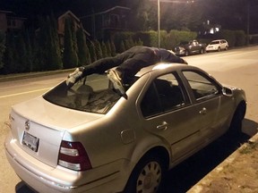 Derek Movold came home from a night shift to discover a drunk man passed out on the roof of a car.