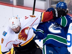 The Canucks' Loui Eriksson (right) had a two goal performance against the Flames. Jake Virtanen (not pictured) also scored for the Canucks.