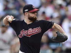 Cleveland Indians pitcher Corey Kluber throws against the Boston Red Sox in the fourth inning during Game 2 of baseball's American League Division Series, Friday, Oct. 7, 2016, in Cleveland. Blue Jays broadcaster Jerry Howarth won't be using the word "Indians" when he calls the American League Championship Series between Toronto and Cleveland, and he says he hasn't uttered the team nickname on the air for nearly 25 years.