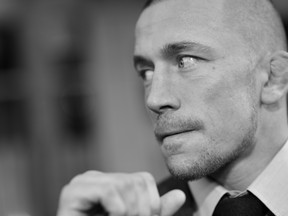 HOLLYWOOD, CA - MARCH 13:  (EDITORS NOTE: Image shot on black and white film. Color version not available.) Actor Georges St-Pierre attends Marvel's "Captain America: The Winter Soldier" premiere at the El Capitan Theatre on March 13, 2014 in Hollywood, California.  (Photo by Charley Gallay/Getty Images for Disney)
