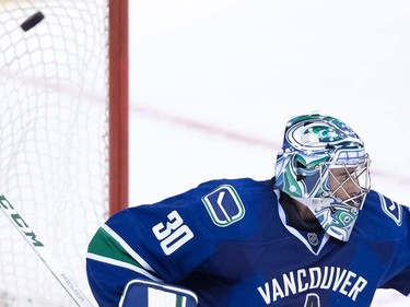 Vancouver Canucks' goalie Ryan Miller allows the winning goal to San Jose Sharks' Matt Nieto during the overtime period of a pre-season NHL hockey game in Vancouver, B.C., on Sunday October 2, 2016.