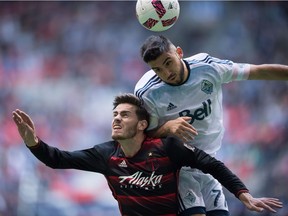 Portland Timbers' Lucas Melano, left, and Whitecaps captain Pedro Morales vie for the ball in Sunday's MLS season-ender, which was probably Morales's last game as a Whitecap.