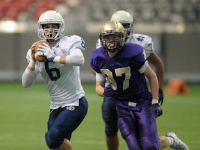 Notre Dame quarterback Steve Moretto threw three TD passes and ran for another Friday as his No. 3 Jugglers doubled host Belmont 28-14 in Victoria. (PNG file photo)