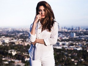 Noureen DeWulf is an actress who starred opposite Charlie Sheen on Anger Management. She is married to Vancouver Canucks goalie Ryan Miller.