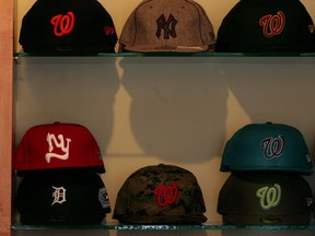 Baseball caps on sale in a high-end sneaker store in Washington