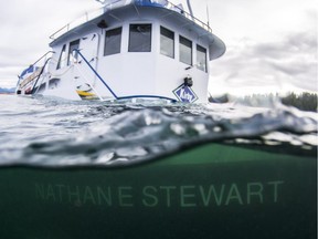 The sinking of a tug and the subsequent diesel spill on B.C's Central Coast is prompting a rethink to emergency response that could allow those closest to the disaster to take the lead, the federal indigenous affairs minister has said. The tugboat Nathan E. Stewart is seen in the waters of the Seaforth Channel near Bella Bella in an Oct. 23 handout photo.