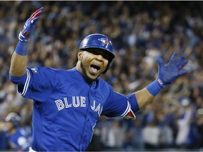 The Toronto Blue Jays' Edwin Encarnacion hits a 3 run homer to give the Jays the win in the Wild Card Game in October.