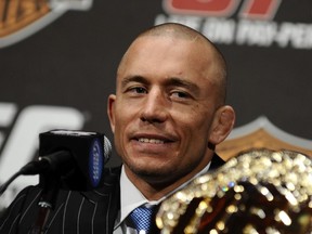 NEW YORK - MARCH 24: Georges St-Pierre of Montreal, Quebec, Canada speaks at a press conference for UFC 111 at Radio City Music Hall on March 24, 2010 in New York City. (Photo by Jeff Zelevansky/Getty Images)