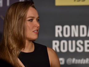 Ronda Rousey of the US talks to the press before a face-off for the UFC fight in Melbourne on November 13, 2015.  Over 55,000 are expected to attend the UFC fight between Rousey and compatriot Holly Holm in Melbourne on November 15.