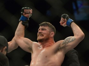 Michael Bisping reacts after defeating Luke Rockhold in their Middleweight Title Bout at UFC 199 at The Forum on June 4 in Inglewood, Calif.
