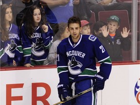 Vancouver Canucks Brandon Sutter 21, takes warm up as the Canucks prepare to battle the Arizona Coyotes in pre season action in Rogers Arena in Vancouver on September 28, 2015.