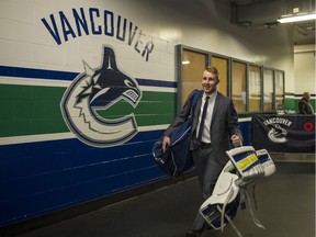 UBC's Matt Hewitt arrives at Rogers Arena on Tuesday night to take up backup goalie duties for the Vancouver Canucks.