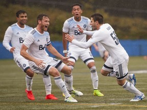Vancouver Whitecaps FC2 Daniel Haber, right, celebrates after scoring what proved to the be the game-winning goal against OKC Energy FC during USL playoff soccer action at Thunderbird Stadium at UBC on Saturday.