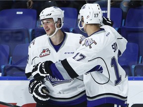 Victoria Royals forward Jack Walker, left, had seven goals against the Vancouver Giants last season and added three more Wednesday night a 3-2 Victoria win.