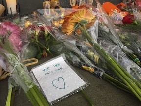 A memorial with candles and flowers for the two young women attacked at Abbotsford Senior Secondary, sits outside the Abbotsford Arts centre, Abbotsford, November 02 2016.