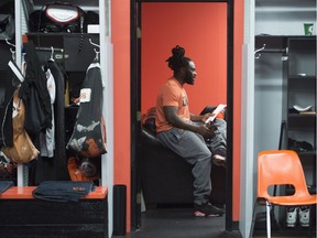 B.C. Lions linebacker Solomon Elimimian sits in the team's clubhouse in Surrey on Tuesday as the players cleaned out their lockers. The Lions' season is over after Sunday's loss to Calgary.