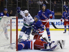 Alex Burrows of the Canucks celebrates his goal at 9:21 of the third period.