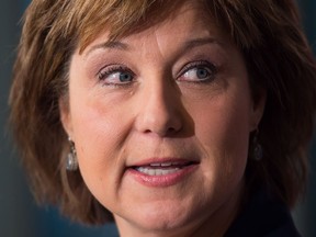 Premier Christy Clark responds to the federal government approval of the Kinder Morgan Trans Mountain Pipeline expansion project, during a news conference in Vancouver on Wednesday.