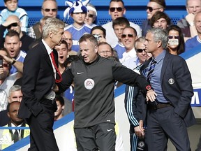 Jose Mourinho, right, and Arsene Wenger, left, have long had an acrimonious relationship. Their rivalry will be renewed this weekend when Arsenal plays Manchester United, Mourinho's new team.