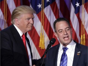 President-elect Donald Trump, left, stands with Republican National Committee Chairman Reince Priebus during an election night rally in New York. Trump on Sunday named Priebus as his White House chief of staff.