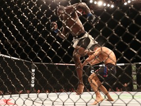 Uriah Hall of Jamaica kicks Gegard Mousasi of Iran in their middleweight bought during UFC Fight Night at Saitama Super Arena in Japan on Sept. 27, 2015