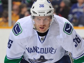 Jannik Hansen suffered a shoulder injury and then also fought Saturday. (Getty Images).