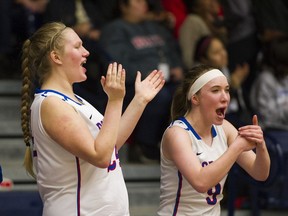 Brookswood's Brooklyn Golt (left) and Tavia Jasper of the Brookswood Bobcats, enter the new girls triple-A hoops season ranked No. 1.