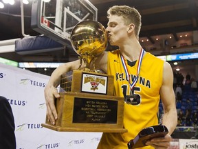 Kelowna Owls' Grant Shephard kisses the MVP trophy after being named the tournament MVP at the 2016 Boys 'AAAA' High School Basketball Championships at the Langley Event Centre. Shephard joined Florida’s famed Montverde Prep, a school that's produced two notable high picks in the past two NBA drafts.