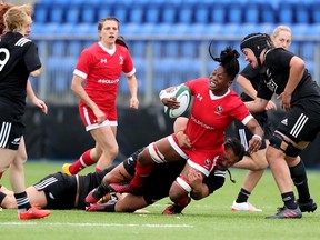 Canada's LaToya Blackwood is tackled by the New Zealand Black Ferns during Wednesday's test match in Dublin.