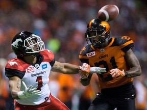 B.C.'s Ryan Phillips defends against Calgary's Lemar Durant in August. The 34-year-old Phillips has just completed his 12th season with the Lions and wants to stay with the team.