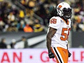 B.C. Lions linebacker Solomon Elimimian celebrates his sack on Hamilton Tiger-Cats quarterback Zach Collaros during the first half of their CFL game in Hamilton, Ont., Saturday, October 4, 2014.The league's most outstanding player in 2014, the B.C. Lions linebacker ruptured his Achilles tendon last August and was lost for the season.