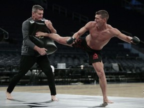 Stephen Thompson, right, works out ahead of his UFC 205 mixed martial arts bout against Tyron Woodley during an open workout, Wednesday at Madison Square Garden in New York. Woodley will square off against Thompson during their match on Saturday.