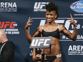 Angela Hill weighs in at UFC 188 in Mexico City. Now the Invicta FC strawweight champ, Hill defends her title Friday night in Kansas City. (photo credit Esther Lin / MMAFighting.com)