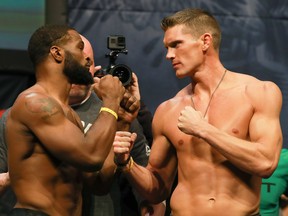 NEW YORK, NY - NOVEMBER 11:  UFC Welterweight Champion Tyron Woodley and Stephen Thompson face off during UFC 205 Weigh-ins at Madison Square Garden on November 11, 2016 in New York City.  (Photo by Michael Reaves/Getty Images)
