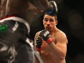 SYDNEY, AUSTRALIA - NOVEMBER 08:  Robert Whittaker of Australia shapes up to Clint Hester in their middleweight fight during the UFC Fight Night 55 event at Allphones Arena on November 8, 2014 in Sydney, Australia.  (Photo by Mark Kolbe/Getty Images)