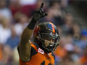 Lions Bryan Burnham gestures after scoring a touchdown against the Hamilton Tiger-Cats in a regular-season game at B.C. Place Stadium in Vancouver on Aug. 13. Gerry Kahrmann/PNG files