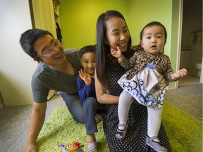 Mom Trang Le and dad Chinh Pham with Alex, 4 1/2, and Alina, 9 1/2 months at their home in Surrey.