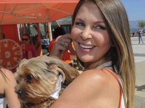 Former Real Housewives of Vancouver star Mary Zilba and her dog George in 2013.